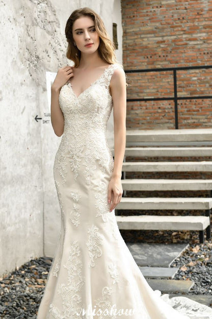 Vestido de novia de sirena con escote en V y encaje floral, sin mangas