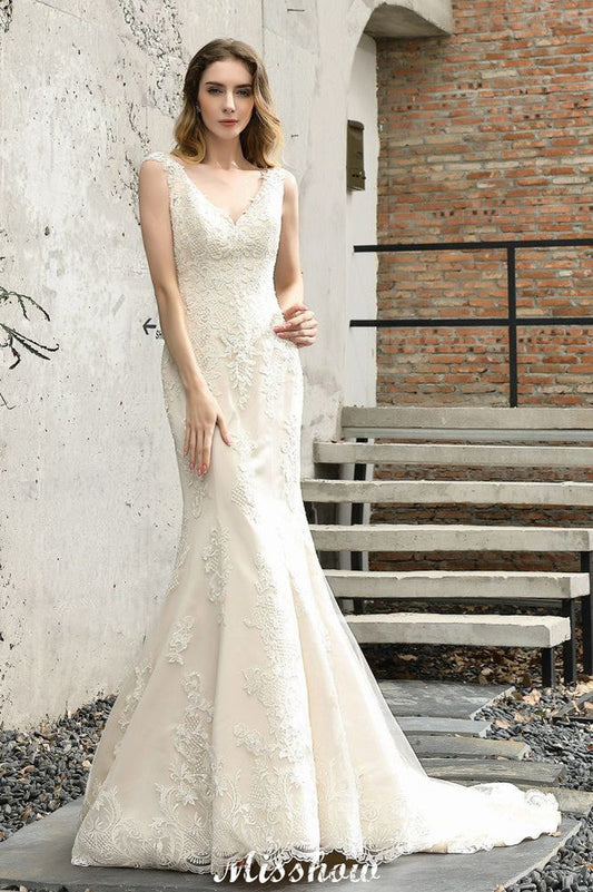 Vestido de novia de sirena con escote en V y encaje floral, sin mangas