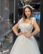 Schickes bodenlanges, ärmelloses A-Linien-Brautkleid aus Tüll mit Herzausschnitt und Applikationen