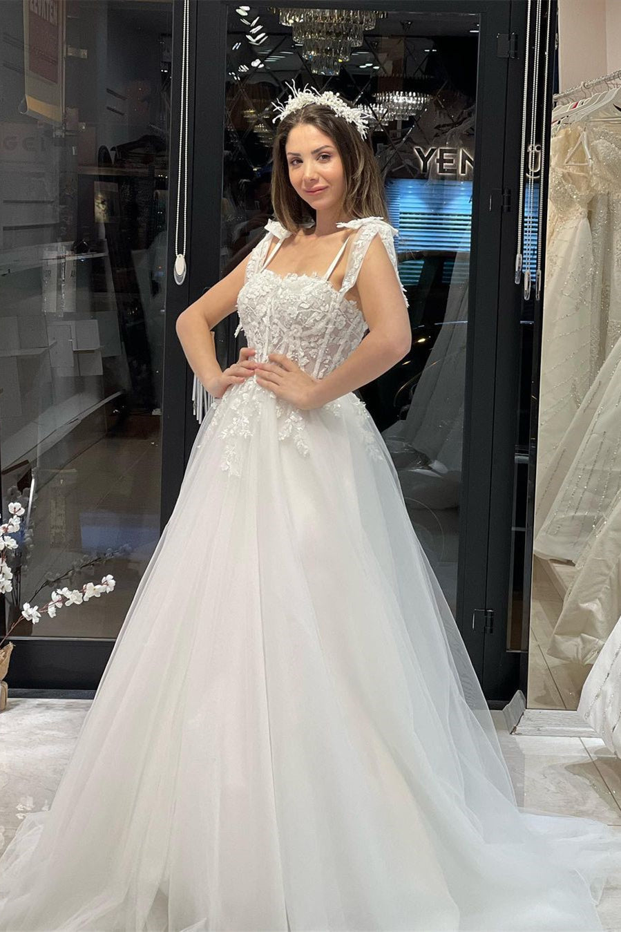 Schickes bodenlanges, ärmelloses A-Linien-Brautkleid aus Tüll mit Herzausschnitt und Applikationen