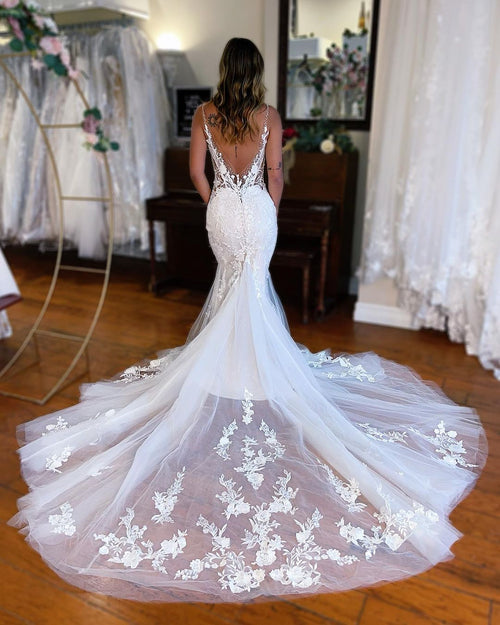 Vestido de novia elegante de encaje sin mangas con escote en V y corte sirena