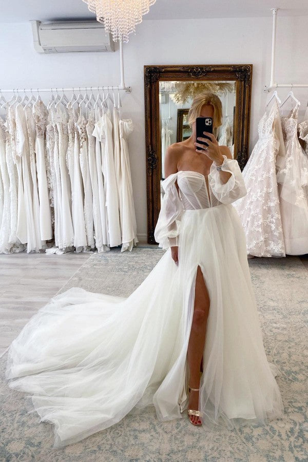Vestido de novia elegante de tul con escote en forma de A, mangas largas y abertura frontal con cola capilla
