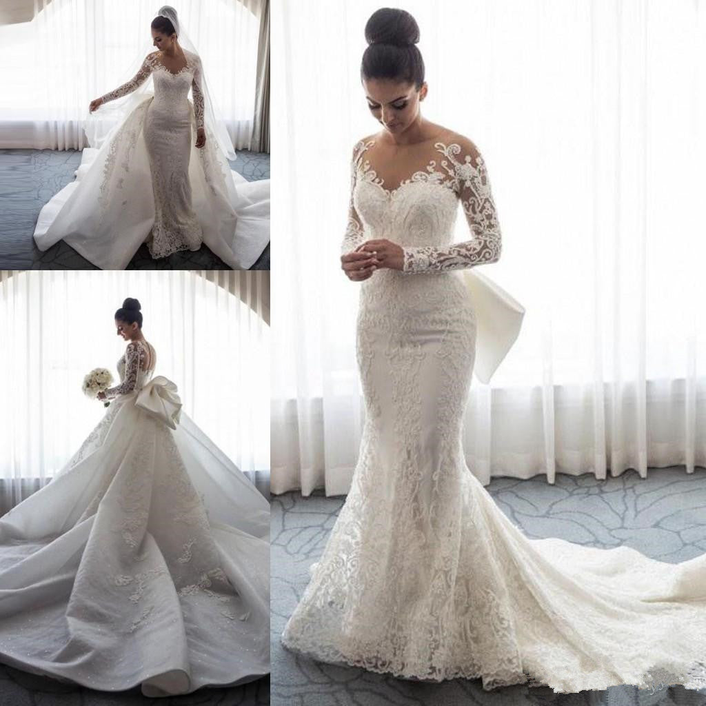 Vestido de novia elegante de sirena con encaje, mangas largas y cola desmontable
