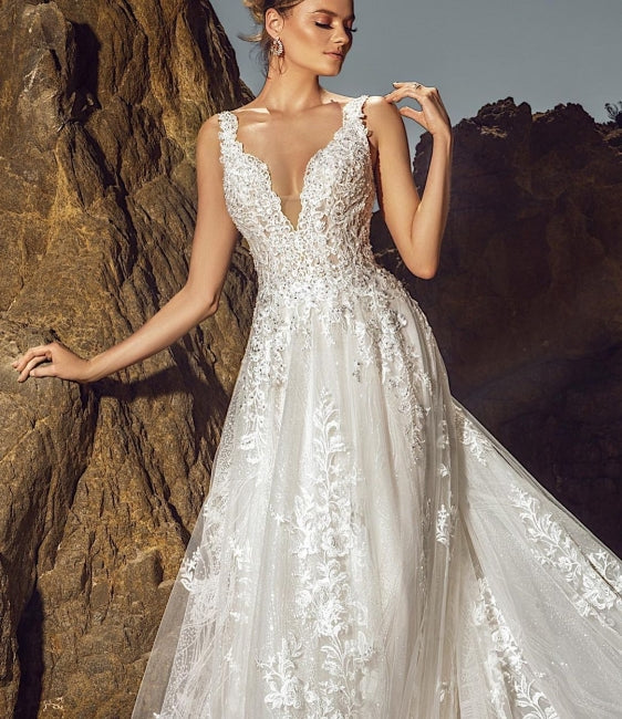 Vestido de novia elegante sin mangas con escote en V, corte A, de tul, con apliques de encaje y bolsillos.