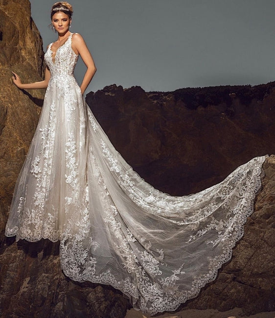 Vestido de novia elegante sin mangas con escote en V, corte A, de tul, con apliques de encaje y bolsillos.