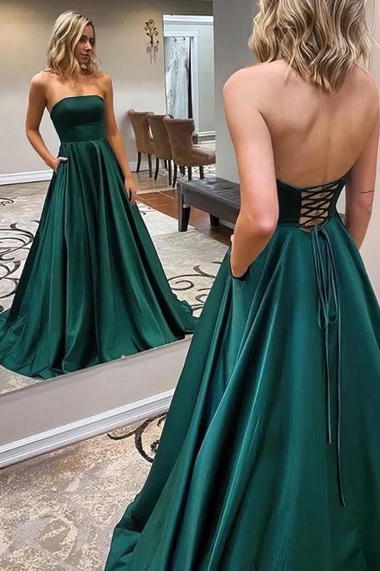 Vestido de fiesta elegante, largo, de satén, sin tirantes, con espalda descubierta y bolsillos.