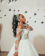 Vestido de novia elegante de tul con encaje, apliques de corazón, corte A y mangas