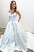 Vestido de novia elegante, largo, corte A, escote corazón, espalda descubierta y bolsillos
