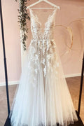 Vestido de novia elegante de corte A largo con apliques de tul y encaje