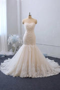 Vestido de novia elegante de tul con encaje, apliques y escote corazón, estilo sirena, largo y sin espalda