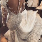 Vestido de novia elegante de sirena con encaje, apliques de corazón y mangas largas con volantes de tul