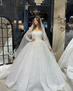 Vestido de novia de lujo de corte A con encaje, mangas largas y volantes, largo hasta el suelo