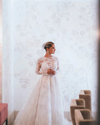 Vestidos de novia de diseñador con corte A, mangas largas, espalda descubierta y encaje