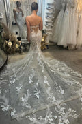 Vestidos de novia de diseño con escote corazón, sin mangas, de tul y encaje color marfil, con apliques y cola