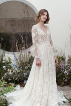 Vestidos de novia de diseñador con escote en V, encaje y mangas largas