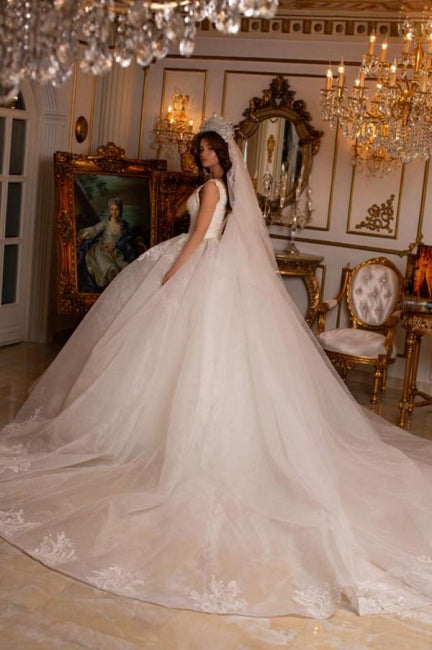 Vestido de novia largo de diseñador con escote en V, sin mangas, apliques y encaje