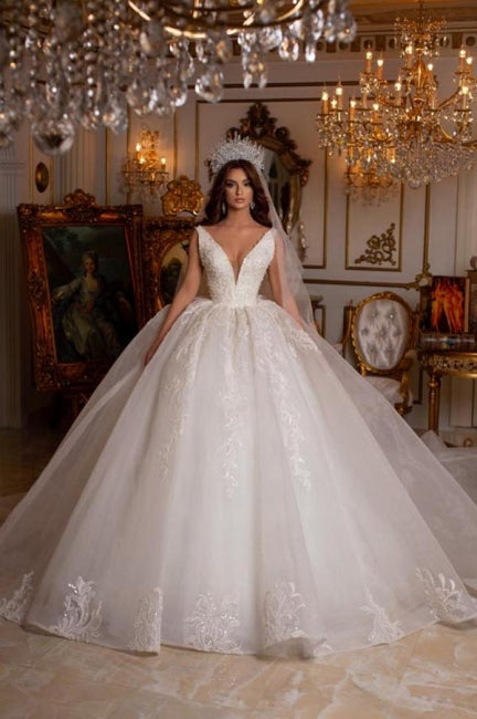 Vestido de novia largo de diseñador con escote en V, sin mangas, apliques y encaje