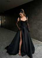 Vestido de fiesta largo negro de diseño, sin mangas, de encaje, corte A y con abertura