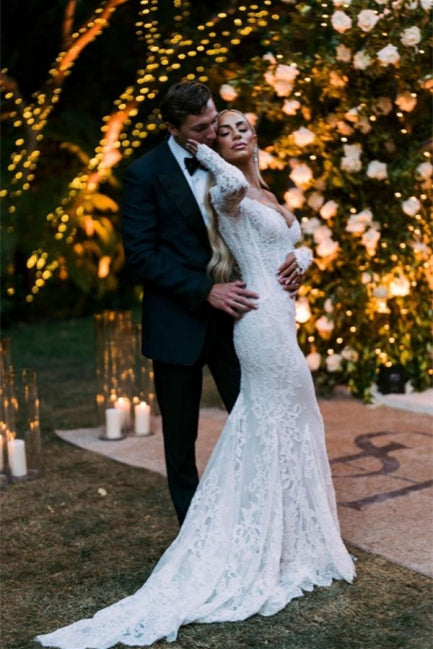 Vestidos de novia de diseñador con hombros descubiertos, mangas largas y corte sirena con encaje