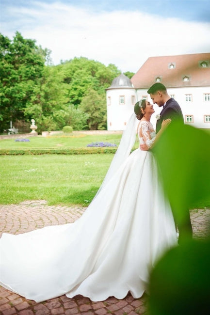 Vestidos de novia largos de satén blanco con escote corazón y mangas largas