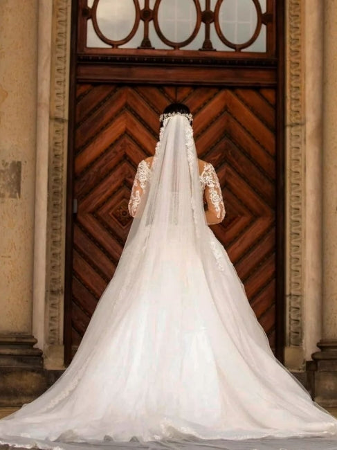 Vestidos de novia de sirena con apliques de corazón y cola, de encaje y manga larga