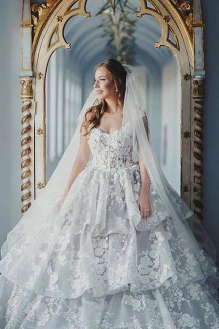 Vestidos de novia de tul con escote corazón, sin mangas y encaje