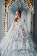 Vestidos de novia de tul con escote corazón, sin mangas y encaje