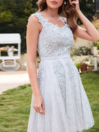 Elegantes vestidos de fiesta de encaje sin mangas con escote en A