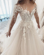 Elegante vestido de novia de tul con encaje y apliques de manga larga y escote en forma de A