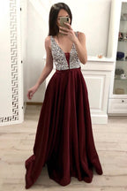 Elegante vestido de fiesta largo de satén con escote en V y espalda abierta con cuentas