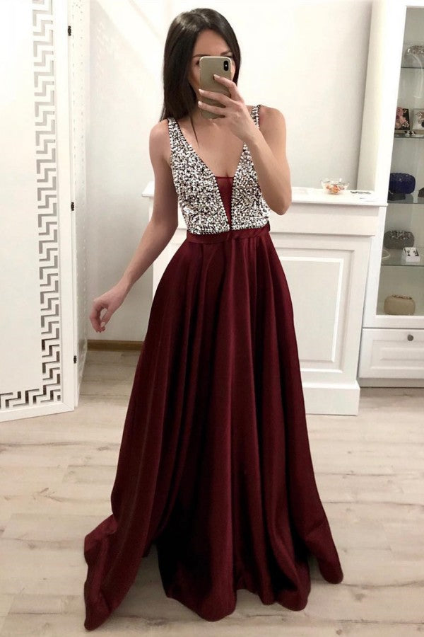 Elegante vestido de fiesta largo de satén con escote en V y espalda abierta con cuentas