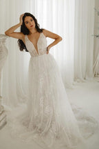 Elegantes vestidos de novia de corte A con escote en V y sin mangas con encaje