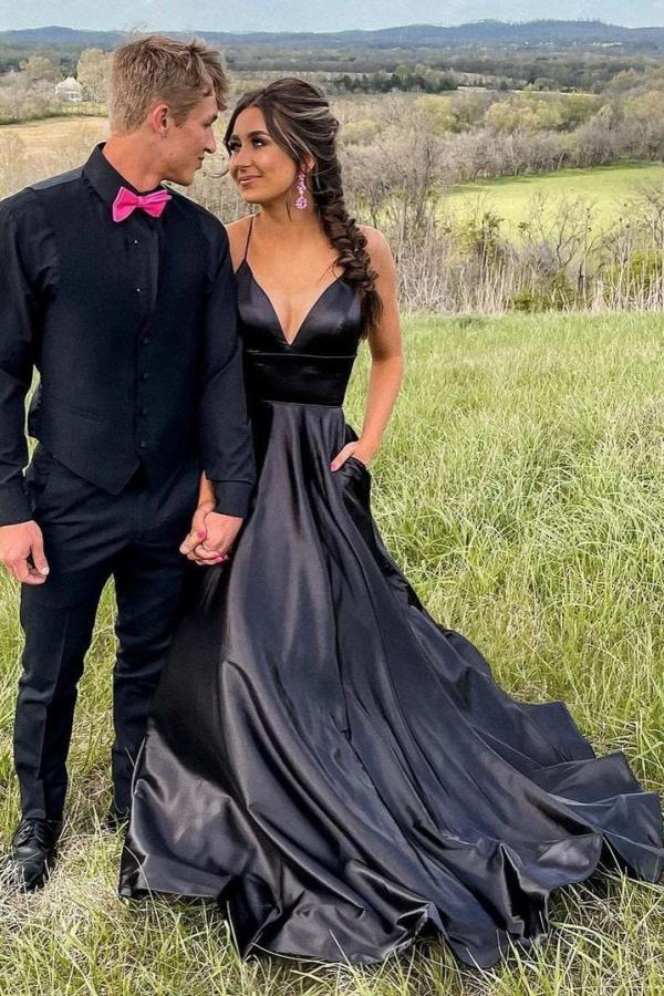 Elegante vestido de fiesta largo negro de corte A con escote en V y bolsillos
