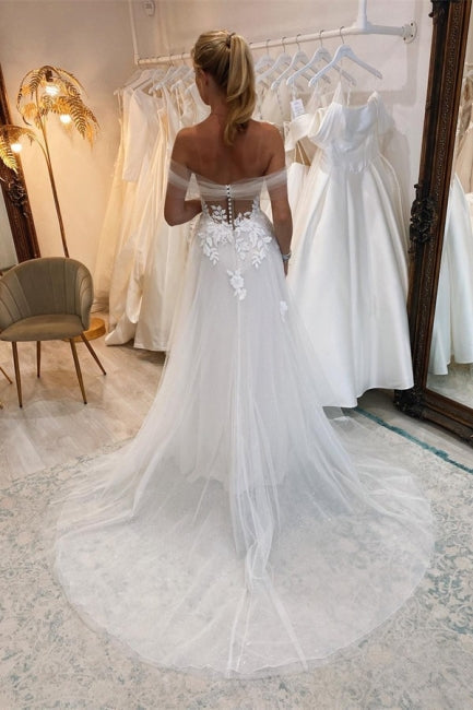 Elegantes vestidos de novia bohemios largos blancos de corte A con encaje y tul sin mangas