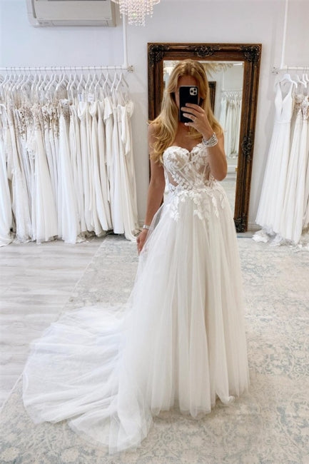 Elegantes vestidos de novia bohemios largos blancos de corte A con encaje y tul sin mangas