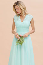 Elegante vestido de dama de honor de gasa con escote en V, sin mangas, largo hasta el suelo, corte A y volantes
