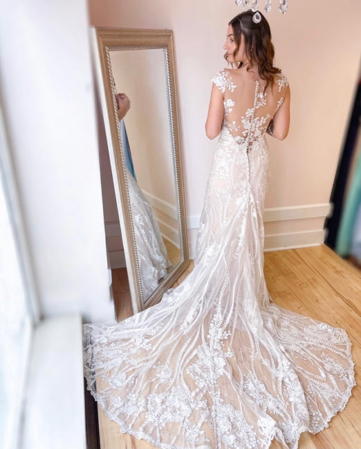 Elegantes vestidos de novia de sirena con apliques de color crema y encaje
