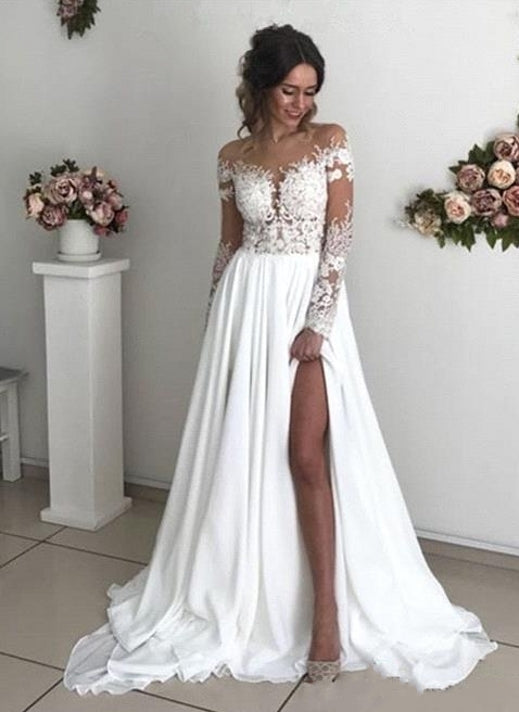 Elegante vestido de novia largo de gasa con encaje, mangas largas y abertura en la espalda