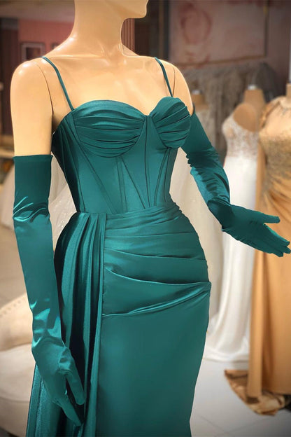 Elegante vestido de fiesta largo verde oscuro con tirantes finos y volantes