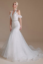 Elegante vestido de novia largo de sirena con cuello halter de tul hasta el suelo con apliques de encaje