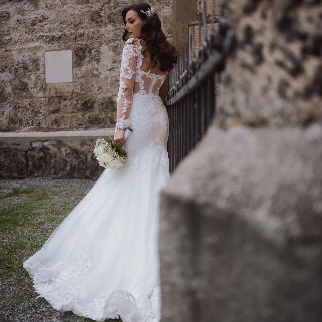 Elegante lange Meerjungfrau-Brautkleider mit offenem Rücken und Ärmeln
