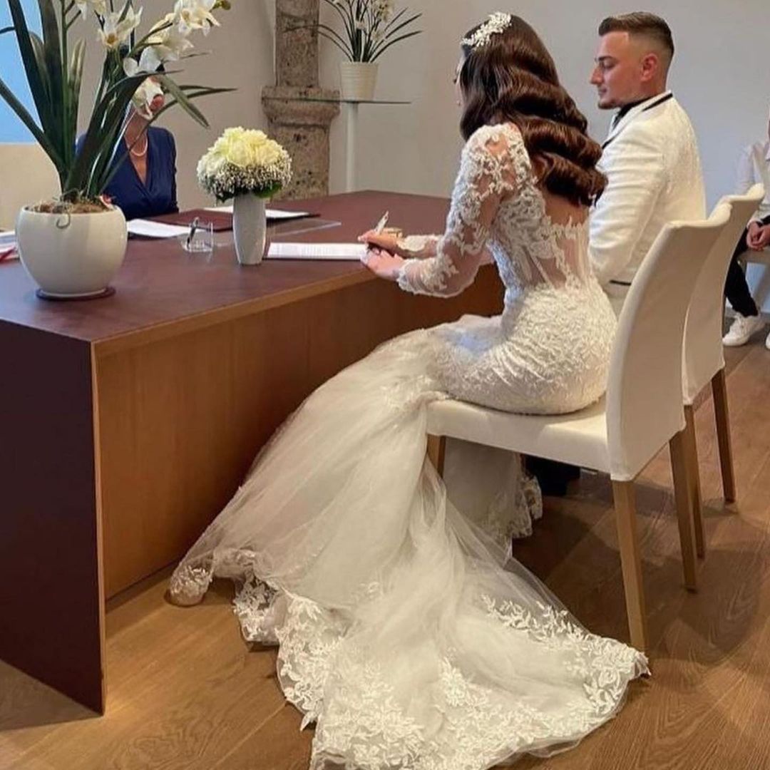 Elegante lange Meerjungfrau-Brautkleider mit offenem Rücken und Ärmeln