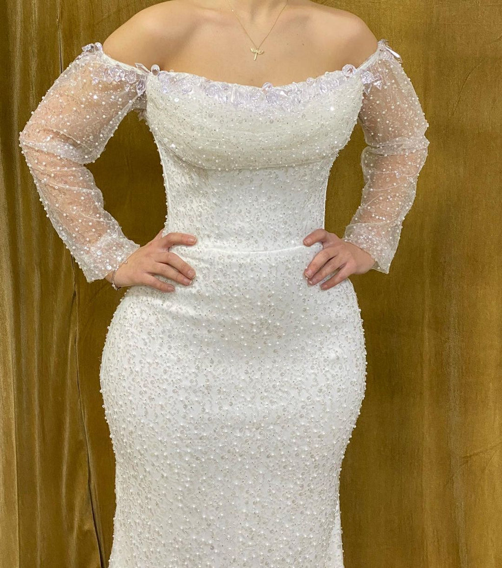 Elegante vestido de fiesta largo de sirena sin tirantes con cuentas y mangas largas