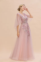 Elegante vestido de novia de tul con corte en A y flores, con mangas largas abullonadas y vestido de fiesta de noche.
