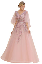 Elegante vestido de novia de tul con corte en A y flores, con mangas largas abullonadas y vestido de fiesta de noche.