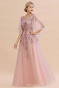 Elegante vestido de novia de tul con corte en A y flores, con mangas largas abullonadas y vestido de fiesta de noche.