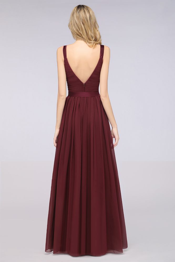 Elegante vestido de dama de honor de gasa con escote en V, tirantes, espalda descubierta y volantes hasta el suelo