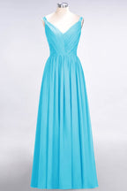 Elegante vestido de dama de honor de gasa con escote en V, tirantes, espalda descubierta y volantes hasta el suelo