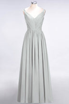 Elegante vestido de dama de honor de gasa con escote en V, tirantes, espalda descubierta y volantes hasta el suelo
