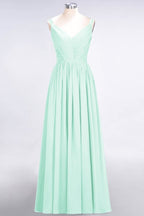 Elegante vestido de dama de honor de gasa con escote en V, tirantes, espalda descubierta y volantes hasta el suelo